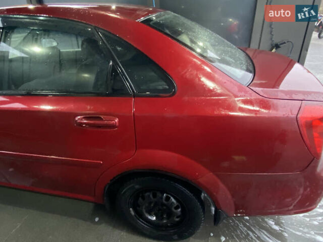 Красный Шевроле Лачетти, объемом двигателя 1.6 л и пробегом 225 тыс. км за 2900 $, фото 2 на Automoto.ua