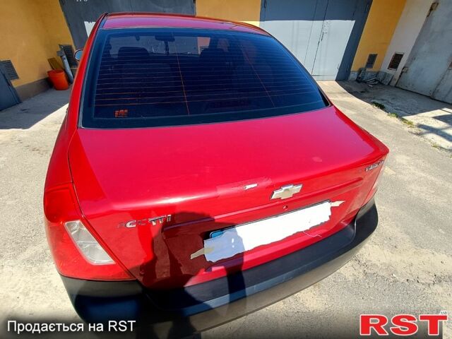 Красный Шевроле Лачетти, объемом двигателя 1.8 л и пробегом 186 тыс. км за 3000 $, фото 2 на Automoto.ua