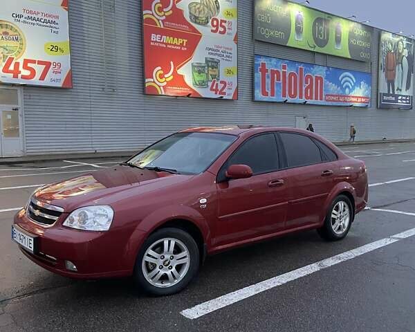 Красный Шевроле Лачетти, объемом двигателя 1.8 л и пробегом 155 тыс. км за 5300 $, фото 1 на Automoto.ua
