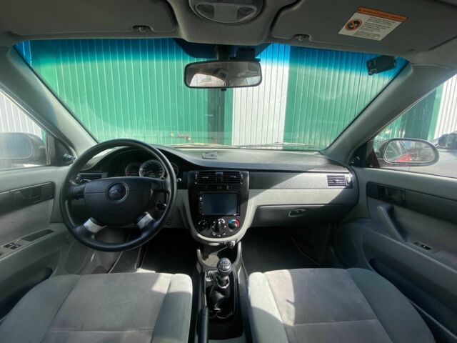 Красный Шевроле Лачетти, объемом двигателя 1.6 л и пробегом 220 тыс. км за 3600 $, фото 17 на Automoto.ua