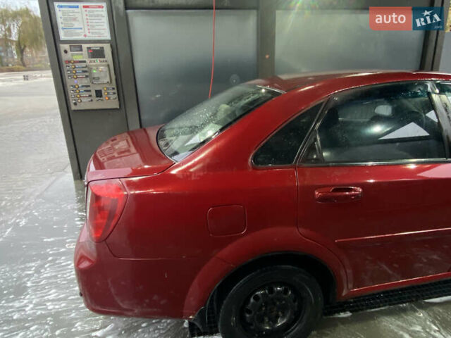 Красный Шевроле Лачетти, объемом двигателя 1.6 л и пробегом 225 тыс. км за 2900 $, фото 5 на Automoto.ua