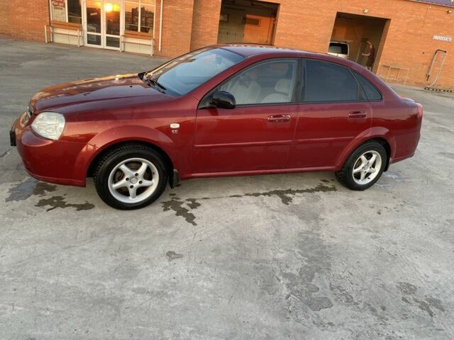 Красный Шевроле Лачетти, объемом двигателя 1.6 л и пробегом 220 тыс. км за 3600 $, фото 6 на Automoto.ua