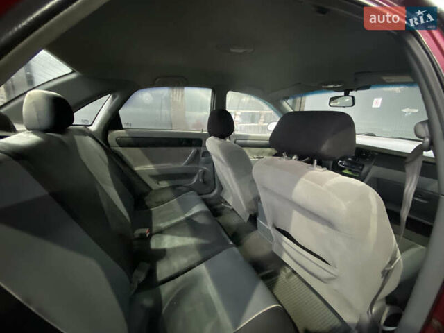 Красный Шевроле Лачетти, объемом двигателя 1.6 л и пробегом 225 тыс. км за 2900 $, фото 9 на Automoto.ua