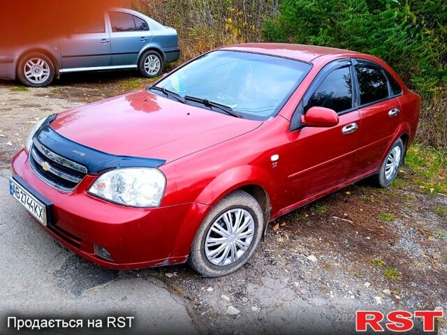 Красный Шевроле Лачетти, объемом двигателя 1.8 л и пробегом 312 тыс. км за 400 $, фото 1 на Automoto.ua
