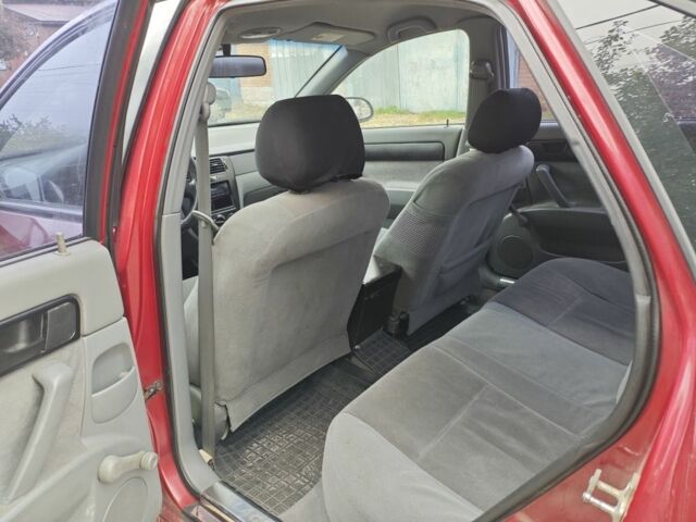 Красный Шевроле Лачетти, объемом двигателя 1.6 л и пробегом 231 тыс. км за 3400 $, фото 7 на Automoto.ua