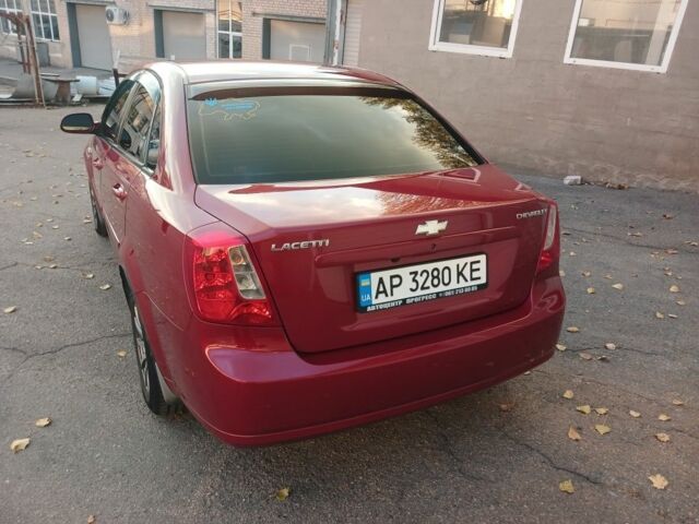 Красный Шевроле Лачетти, объемом двигателя 1.6 л и пробегом 198 тыс. км за 5200 $, фото 1 на Automoto.ua