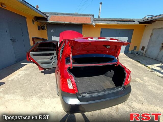 Красный Шевроле Лачетти, объемом двигателя 1.8 л и пробегом 186 тыс. км за 3000 $, фото 5 на Automoto.ua