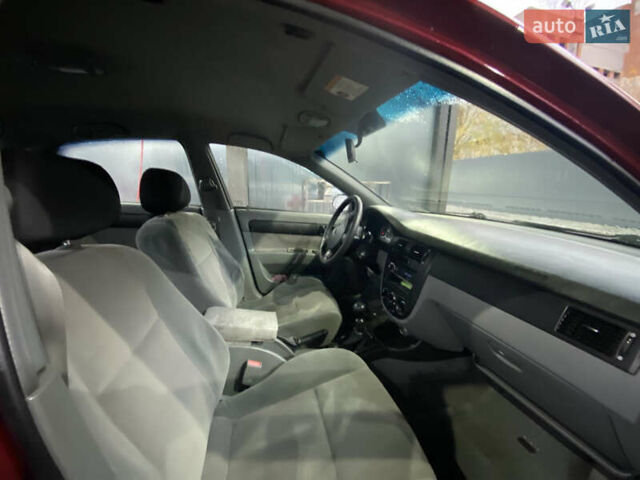 Красный Шевроле Лачетти, объемом двигателя 1.6 л и пробегом 225 тыс. км за 2900 $, фото 10 на Automoto.ua