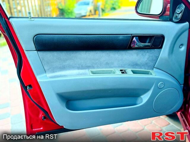 Красный Шевроле Лачетти, объемом двигателя 1.8 л и пробегом 195 тыс. км за 4300 $, фото 5 на Automoto.ua