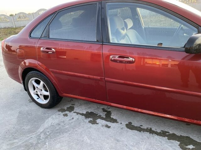 Красный Шевроле Лачетти, объемом двигателя 1.6 л и пробегом 220 тыс. км за 3600 $, фото 13 на Automoto.ua