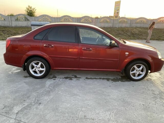 Красный Шевроле Лачетти, объемом двигателя 1.6 л и пробегом 220 тыс. км за 3600 $, фото 10 на Automoto.ua