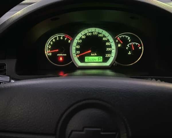 Красный Шевроле Лачетти, объемом двигателя 1.8 л и пробегом 155 тыс. км за 5300 $, фото 8 на Automoto.ua