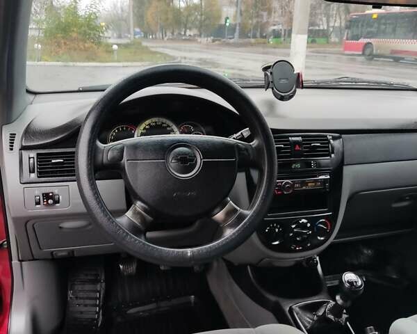 Червоний Шевроле Лачетті, об'ємом двигуна 1.6 л та пробігом 224 тис. км за 3650 $, фото 8 на Automoto.ua