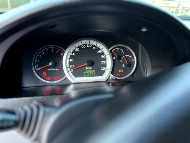 Червоний Шевроле Лачетті, об'ємом двигуна 1.6 л та пробігом 202 тис. км за 5500 $, фото 7 на Automoto.ua