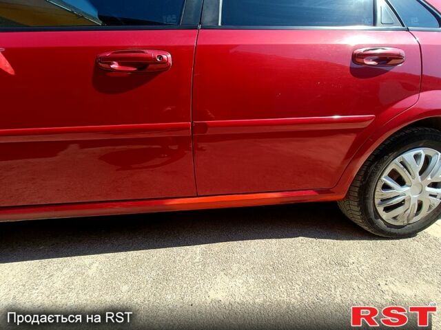 Красный Шевроле Лачетти, объемом двигателя 1.8 л и пробегом 186 тыс. км за 3000 $, фото 6 на Automoto.ua