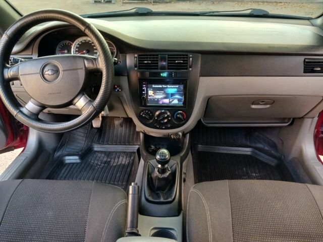 Красный Шевроле Лачетти, объемом двигателя 1.6 л и пробегом 198 тыс. км за 5200 $, фото 3 на Automoto.ua