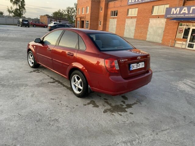Красный Шевроле Лачетти, объемом двигателя 1.6 л и пробегом 220 тыс. км за 3600 $, фото 7 на Automoto.ua