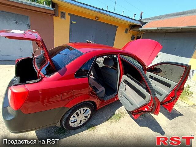 Красный Шевроле Лачетти, объемом двигателя 1.8 л и пробегом 186 тыс. км за 3000 $, фото 4 на Automoto.ua