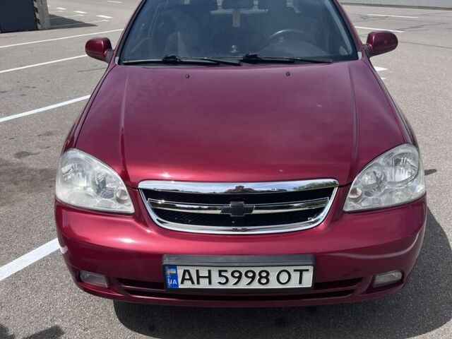 Красный Шевроле Лачетти, объемом двигателя 1.8 л и пробегом 205 тыс. км за 4300 $, фото 1 на Automoto.ua