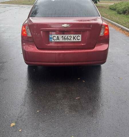 Красный Шевроле Лачетти, объемом двигателя 1.6 л и пробегом 275 тыс. км за 4500 $, фото 2 на Automoto.ua