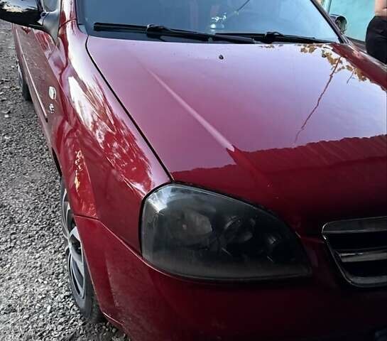 Красный Шевроле Лачетти, объемом двигателя 1.6 л и пробегом 368 тыс. км за 3300 $, фото 5 на Automoto.ua