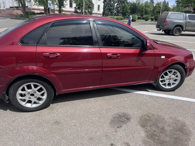 Красный Шевроле Лачетти, объемом двигателя 1.8 л и пробегом 205 тыс. км за 4300 $, фото 3 на Automoto.ua
