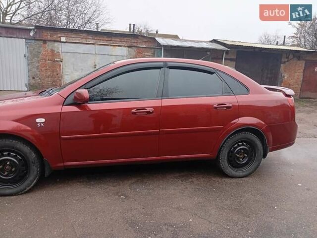 Красный Шевроле Лачетти, объемом двигателя 1.8 л и пробегом 290 тыс. км за 4100 $, фото 4 на Automoto.ua
