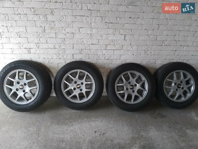 Красный Шевроле Лачетти, объемом двигателя 1.8 л и пробегом 205 тыс. км за 5600 $, фото 8 на Automoto.ua