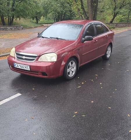 Красный Шевроле Лачетти, объемом двигателя 1.6 л и пробегом 275 тыс. км за 4500 $, фото 7 на Automoto.ua
