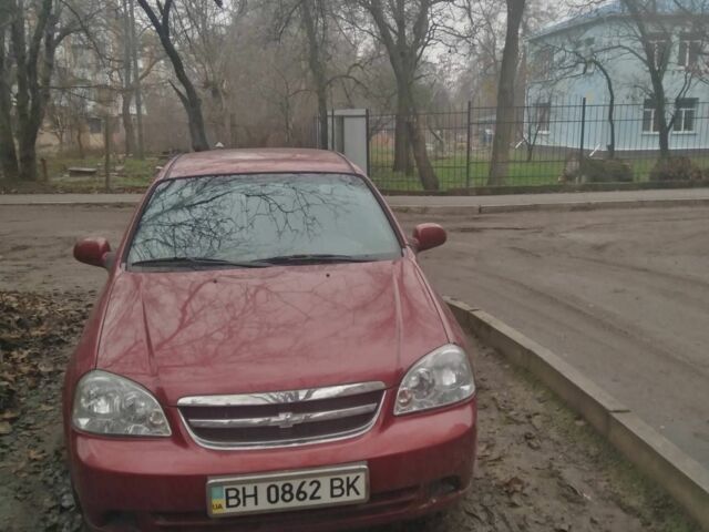 Красный Шевроле Лачетти, объемом двигателя 1.8 л и пробегом 140 тыс. км за 3250 $, фото 4 на Automoto.ua