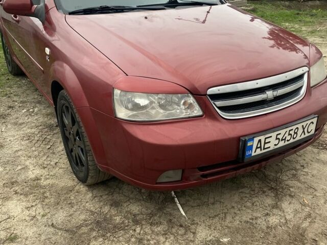 Красный Шевроле Лачетти, объемом двигателя 1.8 л и пробегом 267 тыс. км за 3999 $, фото 3 на Automoto.ua