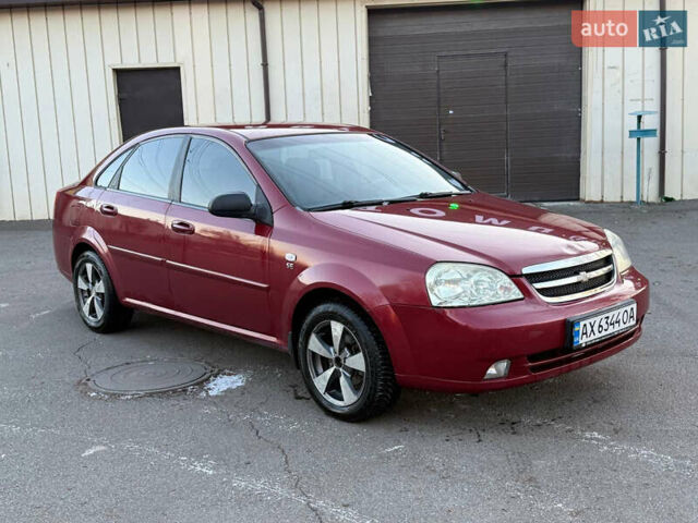 Червоний Шевроле Лачетті, об'ємом двигуна 1.6 л та пробігом 243 тис. км за 3950 $, фото 6 на Automoto.ua