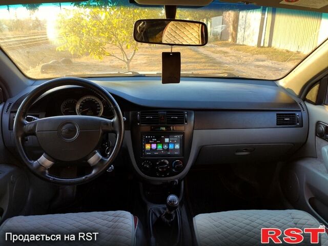 Червоний Шевроле Лачетті, об'ємом двигуна 1.8 л та пробігом 189 тис. км за 3800 $, фото 4 на Automoto.ua