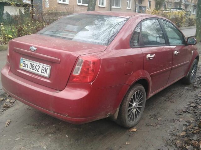Красный Шевроле Лачетти, объемом двигателя 1.8 л и пробегом 140 тыс. км за 3250 $, фото 3 на Automoto.ua