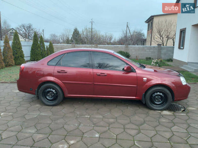 Красный Шевроле Лачетти, объемом двигателя 1.8 л и пробегом 205 тыс. км за 5600 $, фото 1 на Automoto.ua