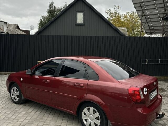 Красный Шевроле Лачетти, объемом двигателя 1.8 л и пробегом 195 тыс. км за 3700 $, фото 1 на Automoto.ua