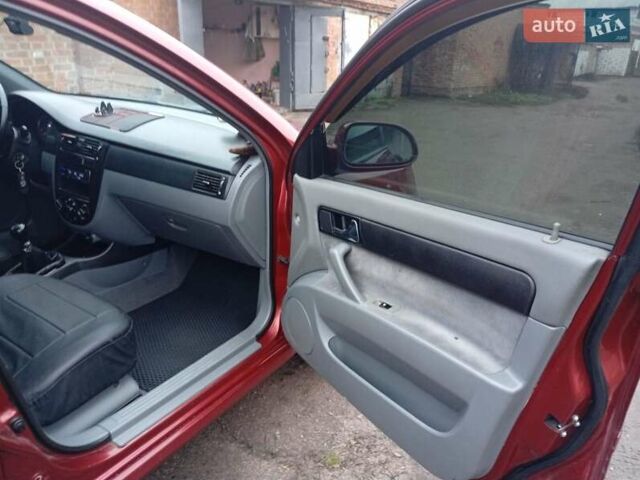 Красный Шевроле Лачетти, объемом двигателя 1.8 л и пробегом 290 тыс. км за 4100 $, фото 16 на Automoto.ua