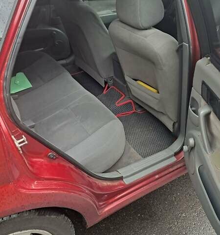 Красный Шевроле Лачетти, объемом двигателя 1.6 л и пробегом 275 тыс. км за 4500 $, фото 11 на Automoto.ua