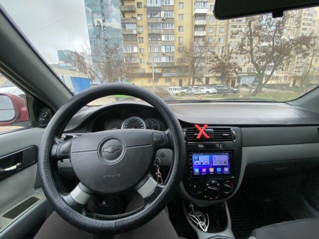 Красный Шевроле Лачетти, объемом двигателя 1.8 л и пробегом 267 тыс. км за 3999 $, фото 6 на Automoto.ua