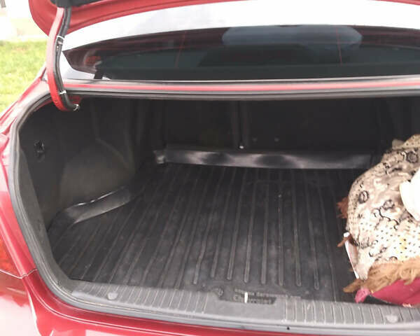 Красный Шевроле Лачетти, объемом двигателя 1.8 л и пробегом 205 тыс. км за 5600 $, фото 5 на Automoto.ua