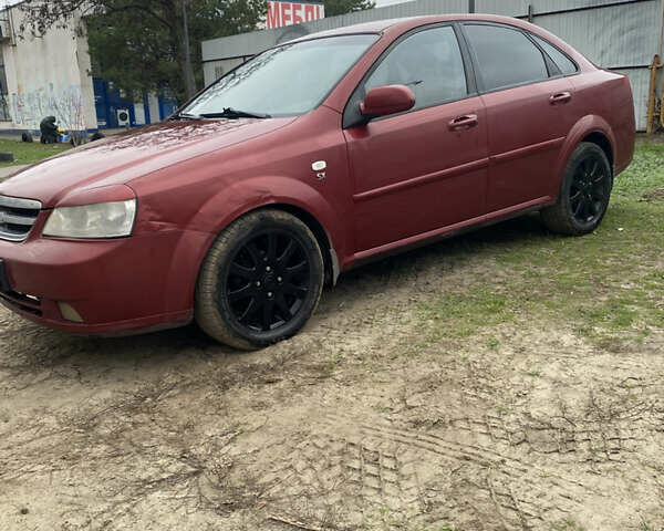Красный Шевроле Лачетти, объемом двигателя 1.8 л и пробегом 267 тыс. км за 3500 $, фото 4 на Automoto.ua