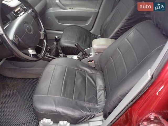 Красный Шевроле Лачетти, объемом двигателя 1.8 л и пробегом 290 тыс. км за 4100 $, фото 12 на Automoto.ua