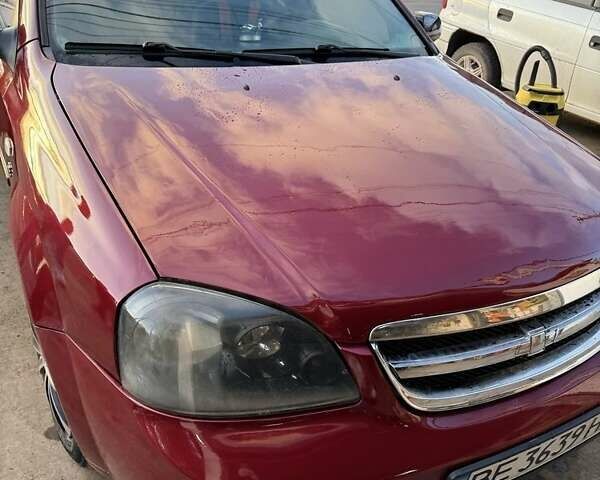 Красный Шевроле Лачетти, объемом двигателя 1.6 л и пробегом 368 тыс. км за 3300 $, фото 2 на Automoto.ua