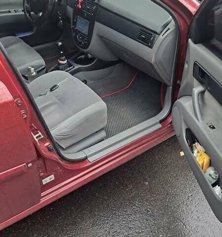 Красный Шевроле Лачетти, объемом двигателя 1.6 л и пробегом 275 тыс. км за 4500 $, фото 15 на Automoto.ua