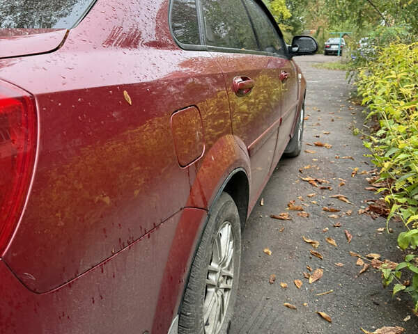 Красный Шевроле Лачетти, объемом двигателя 1.6 л и пробегом 213 тыс. км за 4500 $, фото 10 на Automoto.ua