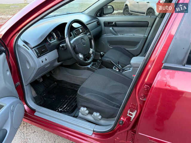 Червоний Шевроле Лачетті, об'ємом двигуна 1.6 л та пробігом 243 тис. км за 3950 $, фото 17 на Automoto.ua