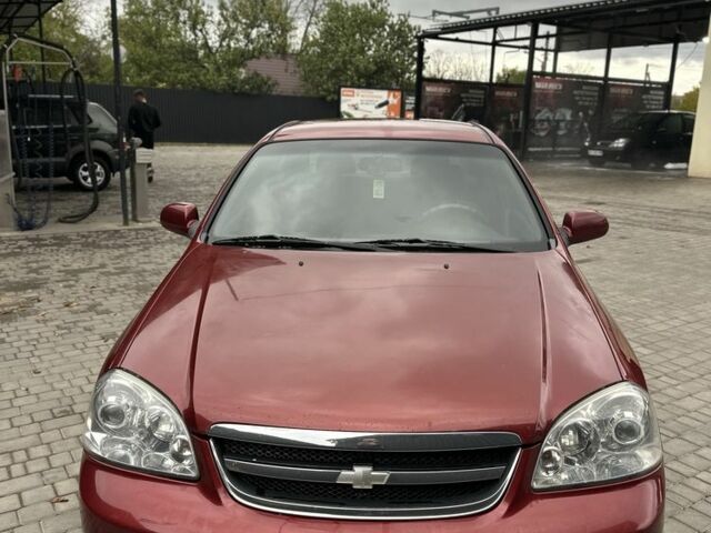 Красный Шевроле Лачетти, объемом двигателя 1.8 л и пробегом 195 тыс. км за 3700 $, фото 2 на Automoto.ua