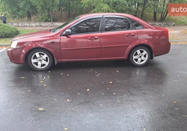 Красный Шевроле Лачетти, объемом двигателя 1.6 л и пробегом 275 тыс. км за 4500 $, фото 1 на Automoto.ua