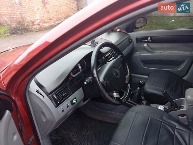 Красный Шевроле Лачетти, объемом двигателя 1.8 л и пробегом 290 тыс. км за 4100 $, фото 13 на Automoto.ua