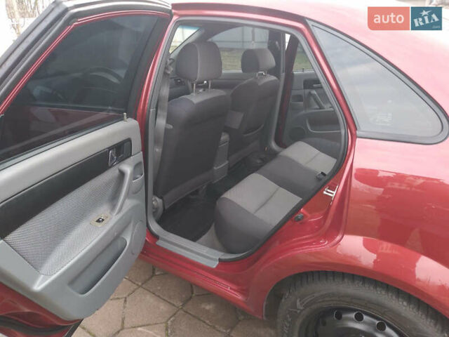 Красный Шевроле Лачетти, объемом двигателя 1.8 л и пробегом 205 тыс. км за 5600 $, фото 3 на Automoto.ua